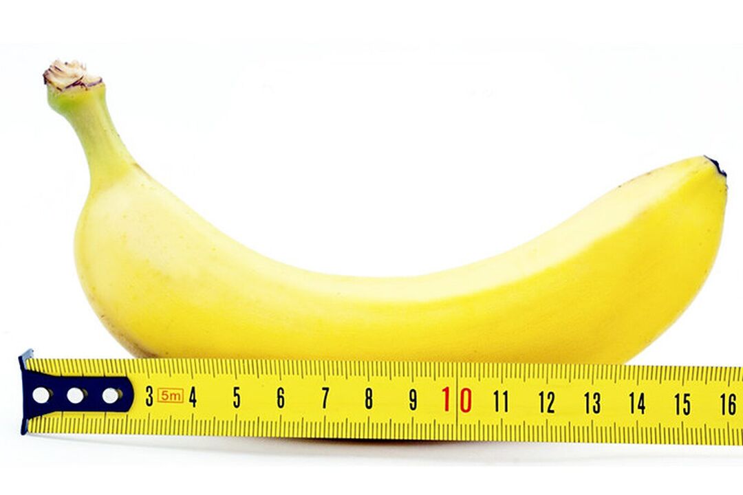 uma banana com uma régua simboliza a medida do pênis após a cirurgia